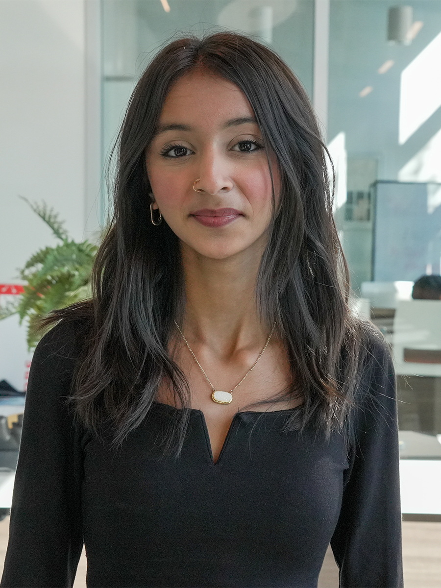 Headshot of a woman wearing a black top